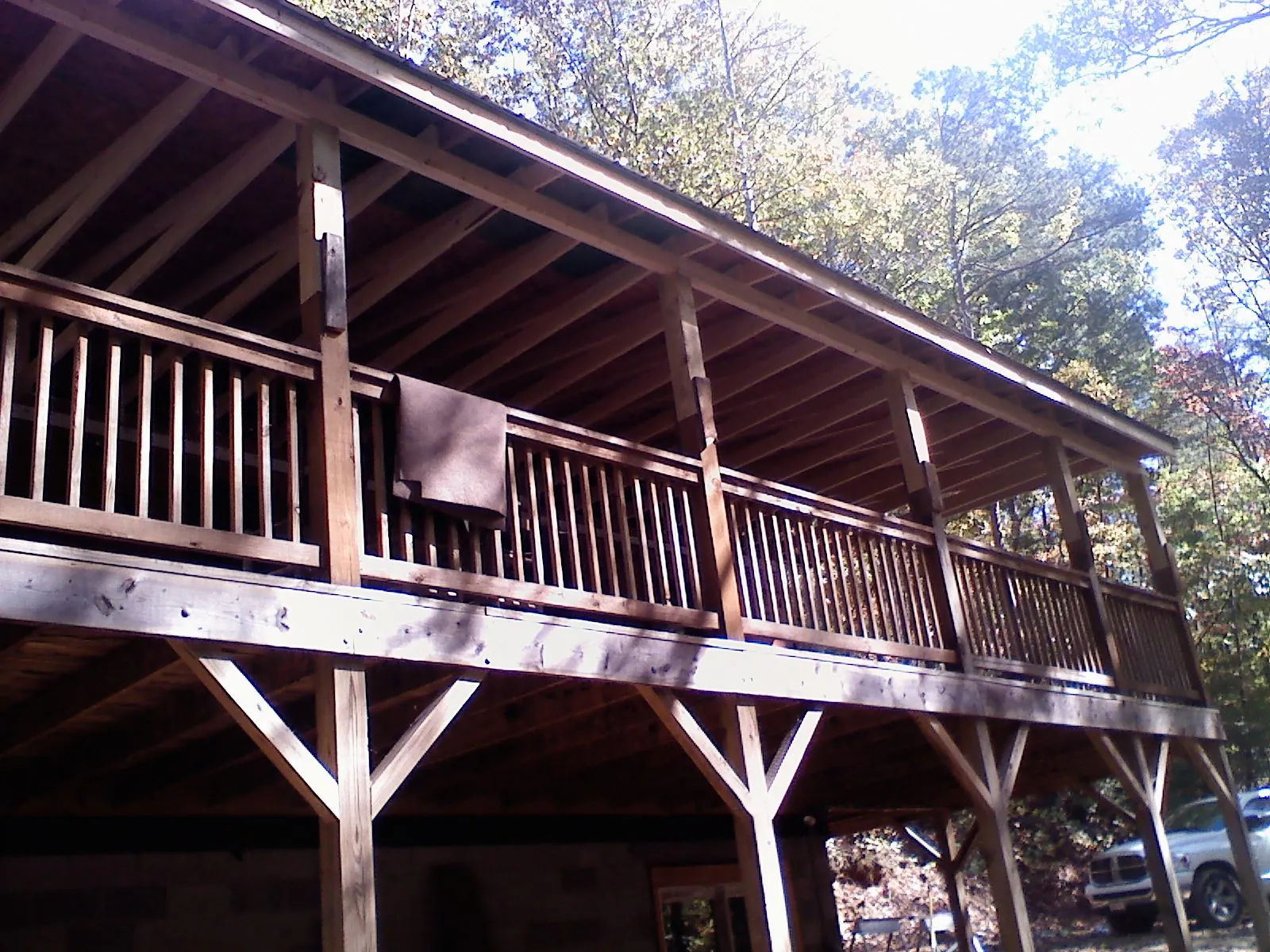 Timber framing under a new elevated porch and deck — Roof Leak Repair in Normalville by Roofing Brothers